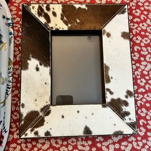 Lazy Susan brand haircalf, leather and nailhead frame. Like new.